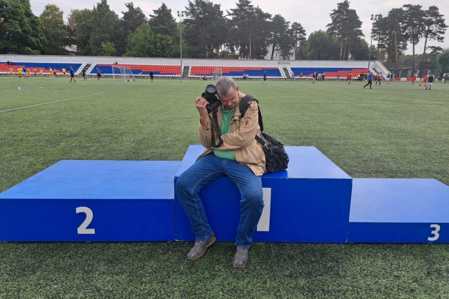 За объективом