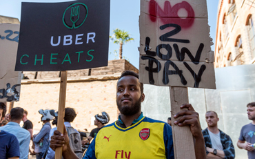 Реальной стачкой по виртуальной занятости